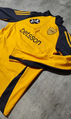 Buzo Boca medio cierre amarillo mangas grises Betsson niño en internet