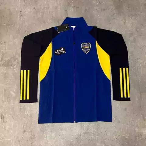 Rompeviento Boca liviano azul claro mangas oscuras