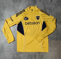 Imagen de Buzo Boca Betsson medio cierre amarillo