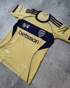 Camiseta Boca Betsson suplente dorada 2026 niño - tienda online