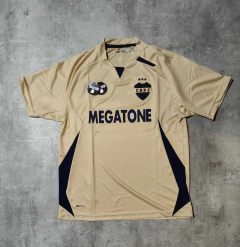 Camiseta Boca entrenamiendo dorada Megatone retro 2007