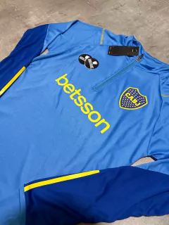 Buzo Boca medio cierre celeste Betsson en internet