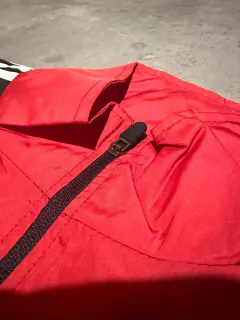 Imagen de Rompeviento River 1994 rojo