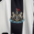 Camisa-Castore-NewCastle-Oficial-Original-2023-2024-Bruno-Guimaraes-39-Casa-da-Champions-Premier-League-Branca-Preto-Brasileiro-PSG-SELA-camiseta-masculina-adulto-tailandesa-1.1-importação-importada-New-Castle-copa-da-liga-volta-a-champions-EUFA-SAF-inglê