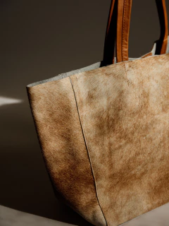 CARTERA ALASKA PELO TOSTADO en internet