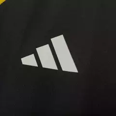 Camisa Atlético Mineiro Treino 25/26 - Torcedor Masculina - Preta com detalhes em amarelo e laranja na internet