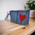 Necessaire Nylon B6 Coração - Com Base 6cm - Antony Produtos - Sacolas retornáveis de nylon e lona e Bolsas feitas com capricho para eventos de alto padrão ou para uso pessoal.