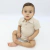 Macacão Gola Polo Listrado Bebê Bege - comprar online