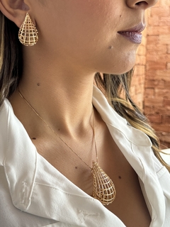 Conjunto gota dourada tramada. na internet