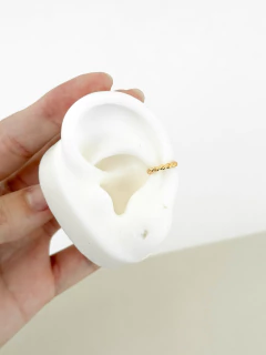 Piercing fake torcido banhado a ouro