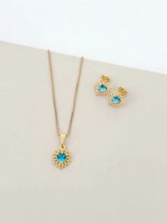 Conjunto rendado azul acqua banhado a ouro