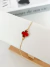 Pulseira trevo vermelho banhada a ouro - comprar online