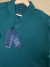 POLO INTERLOCK PIMA VERDE BANDEIRA ARAMIS