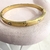 Imagem do bracelete coração e ponto de luz dourado