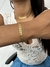 Pulseira seta dourado na internet