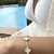 pulseira trevo M dourado na internet