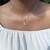 colar borboleta strass