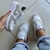 TÊNIS CINZA E BRANCO - comprar online