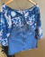 Cropped Daniele estampa floral com olho grego