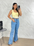 Calça flare lavagem clara , acompanha o cintinho marrom