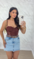 Shorts - saia jeans com barra desfiadinha