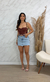 Shorts - saia jeans com barra desfiadinha na internet