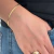PULSEIRA FITA 2MM BANHADA A OURO 18K na internet