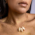 COLAR COM BÚZIOS OXUM BANHADO A OURO 18K