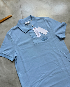 Polo Lacoste Paris - Azul Bebê - comprar online
