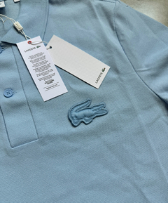 Polo Lacoste Paris - Azul Bebê na internet