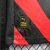Imagem do Camisa Manchester City Away 22/23 Torcedor Puma Masculino - Vermelho e Preto