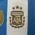 Camisa Argentina 24/25 - Masculina - Versão Torcedor - Três Estrelas + Patch Campeão - Hexa Sports - Artigos Esportivos