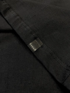 Regata Viés Preta com Branco na internet