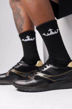 Tênis preto king slum na internet