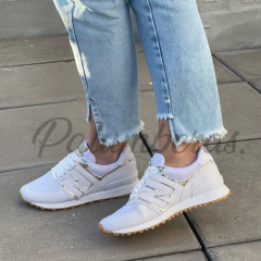 574 Blanco/Dorado en internet