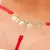 Calcinha Fio Dental Tailandesa Vermelho Strass Frases Tallyta - deitaerolasexshop