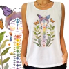 Camiseta branca com estampa colorida de uma figura feminina rodeada por plantas e borboletas, representando temas de ufologia e seres mágicos.