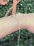 Pulseira triângulos na internet