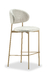 Banqueta Dourada Linea com design moderno e sofisticado, estofada em tecido claro e estrutura metálica dourada.