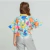 conjunto infantil com flores coloridas