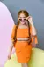 conjunto laranja com saia