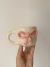 Taza moño rosa on internet