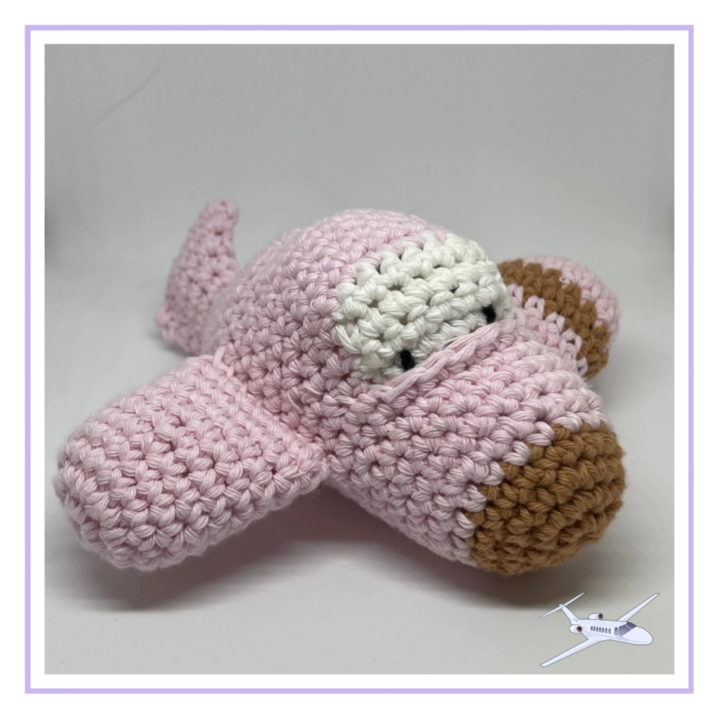 Avión de peluche Rosa