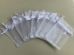 Saquinhos de organza para lembrancinhas, joias, chaveiros, branco, pacote com 10 unidades na internet