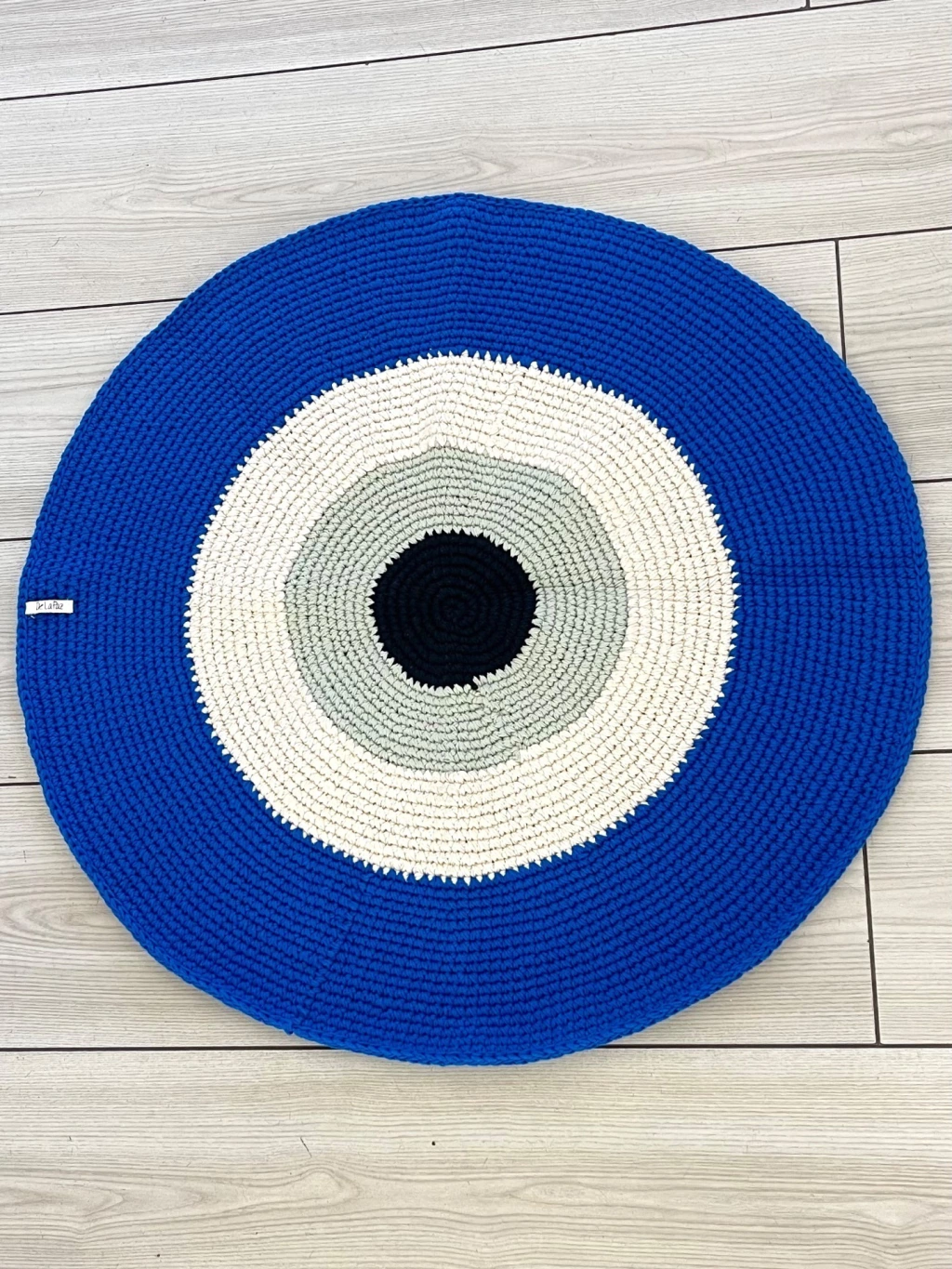 alfombra ojo azul