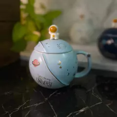 TAZA PREMIUM ASTRONAUTA CON CUCHARITA C/U en internet