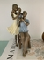 escultura casal com menininho