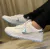 Tênis Dunk Low Sb White MULHER na internet