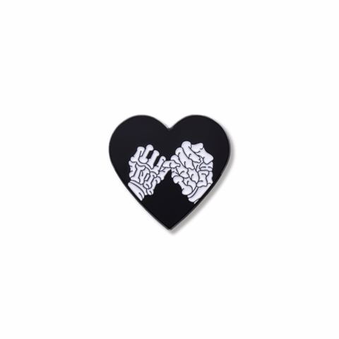 Pin corazón manos esqueletos
