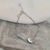 Pulseira coração crucifixo cravejado - comprar online